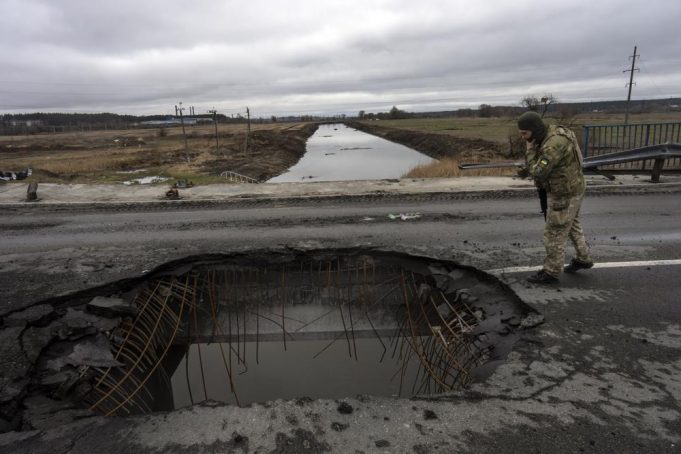 Ukrainian forces retake areas near Kyiv amid fear of traps.